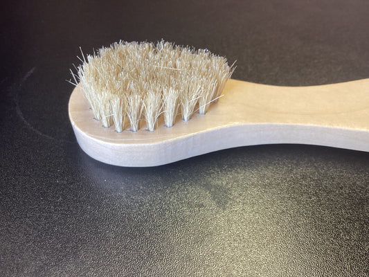 Face Exfoliator / Facial brush.